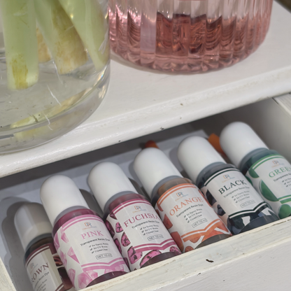 UV resin colourants in several colours to personalise the necklace background at the botanical jewellery workshop
