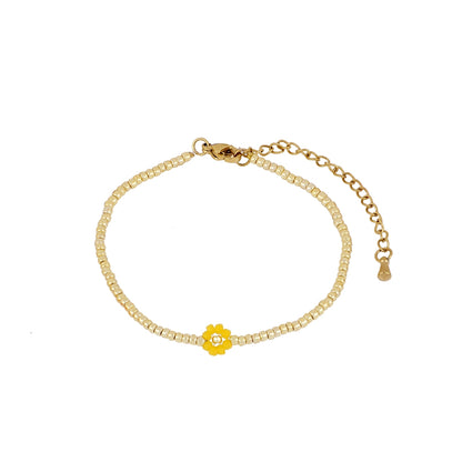 Pulsera de cuentas Miyuki con flor de colores – joyería artesanal de El Born, Barcelona